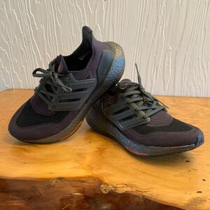 Adidas ultra boost light. Double black with red accents. women’s 7. Men 5.5